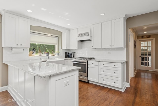 33 Citation Cir, Wheaton, IL 60189 - kitchen with stainless steel gas stove, custom range hood, white cabinets, tasteful backsplash, and recessed lighting