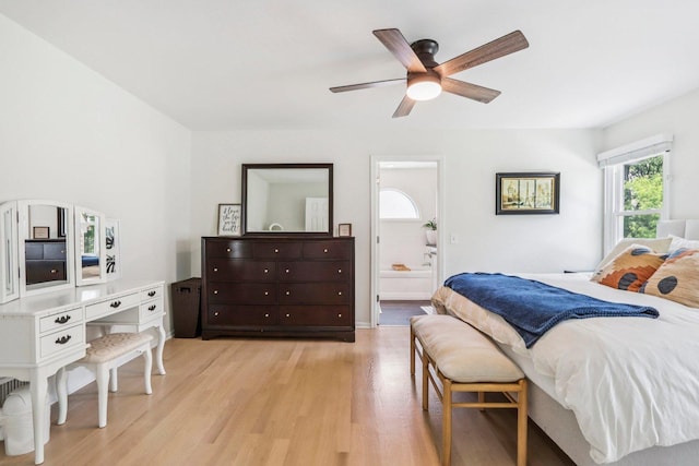 7004 Bennington Dr, Gurnee, IL 60031 - bedroom with light wood finished floors, ensuite bathroom, and a ceiling fan
