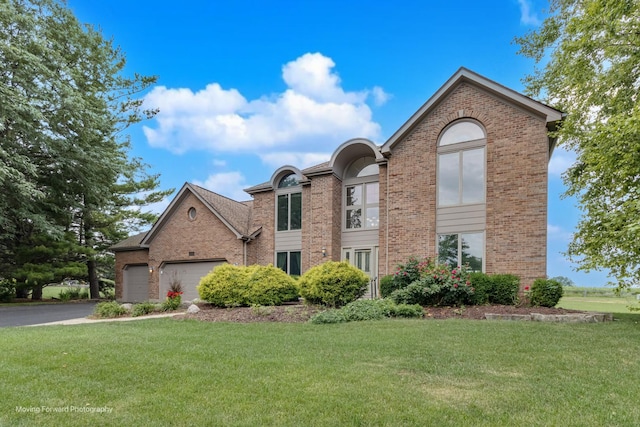 420 Fairway View Dr, Algonquin, IL 60102 - view of front of property with brick siding, a front lawn, a garage, and driveway
