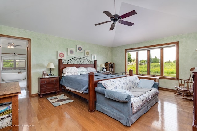420 Fairway View Dr, Algonquin, IL 60102 - bedroom with vaulted ceiling, multiple windows, light wood-type flooring, and a ceiling fan