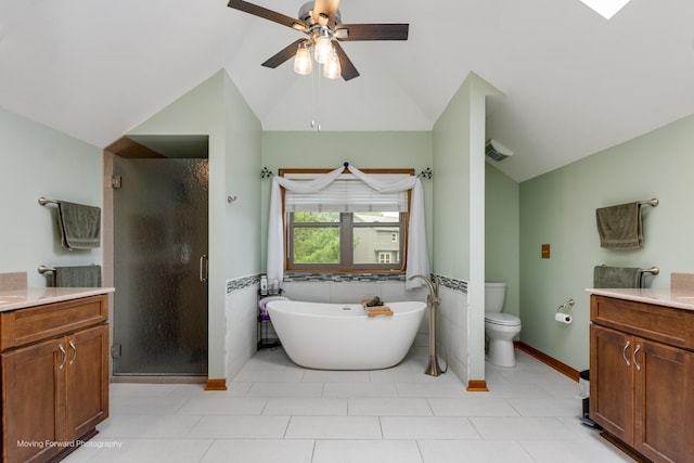 420 Fairway View Dr, Algonquin, IL 60102 - full bath featuring vaulted ceiling, vanity, a ceiling fan, a shower stall, and a soaking tub