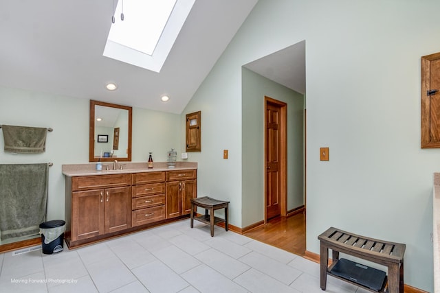 420 Fairway View Dr, Algonquin, IL 60102 - bathroom with a skylight, double vanity, recessed lighting, and high vaulted ceiling