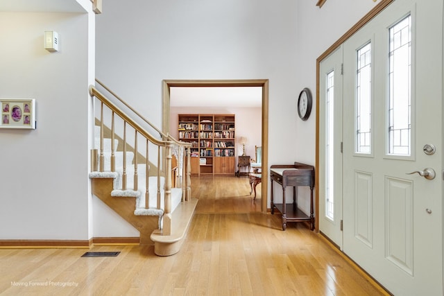 420 Fairway View Dr, Algonquin, IL 60102 - entrance foyer featuring hardwood / wood-style flooring, a high ceiling, and stairway