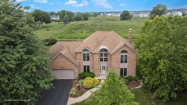 420 Fairway View Dr, Algonquin, IL 60102 - view of front of house featuring brick siding, a chimney, asphalt driveway, and an attached garage