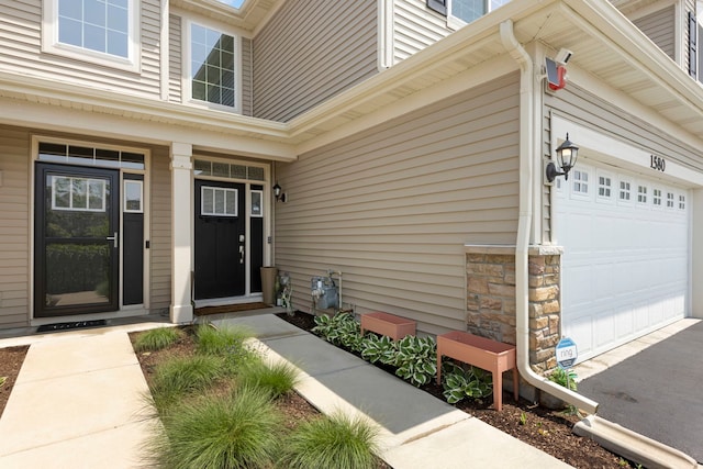 1580 Wind Energy Pass, Batavia, IL 60510 - doorway to property with asphalt driveway and stone siding