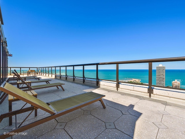 1560 N Sandburg Ter Unit 2403J, Chicago, IL 60610 - view of patio / terrace with a water view