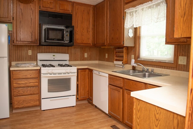 108 N Grove St, Harmon, IL 61042 - kitchen with white appliances and brown cabinetry
