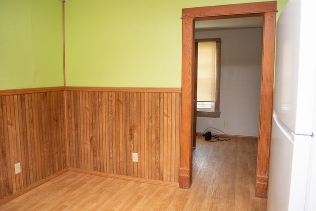 108 N Grove St, Harmon, IL 61042 - spare room with wood finished floors, wooden walls, and a wainscoted wall