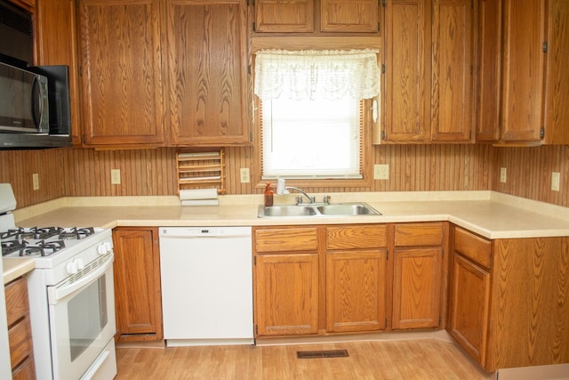 108 N Grove St, Harmon, IL 61042 - kitchen with white appliances, light countertops, and brown cabinets