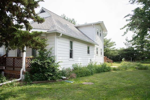 108 N Grove St, Harmon, IL 61042 - view of side of home with roof with shingles and a yard