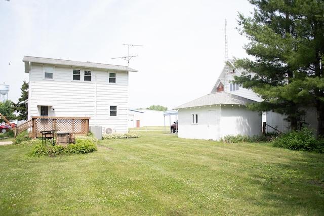 108 N Grove St, Harmon, IL 61042 - back of property featuring a lawn