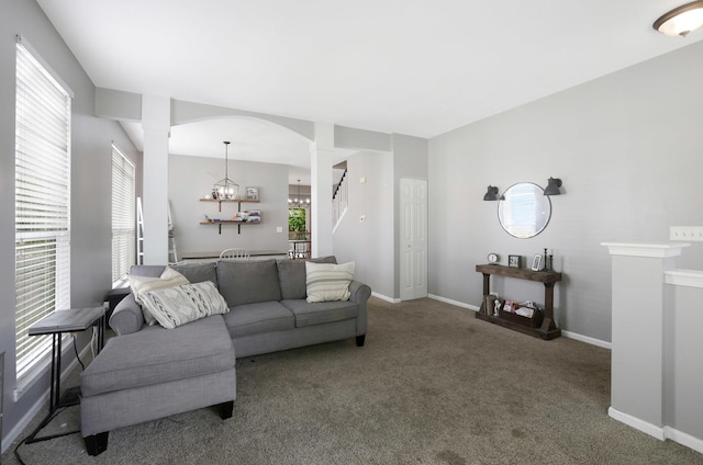 10628 Great Plaines Dr, Huntley, IL 60142 - carpeted living room with ornate columns and healthy amount of natural light
