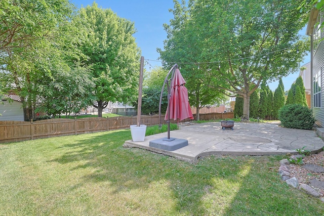 10628 Great Plaines Dr, Huntley, IL 60142 - fenced backyard featuring a patio and a fire pit