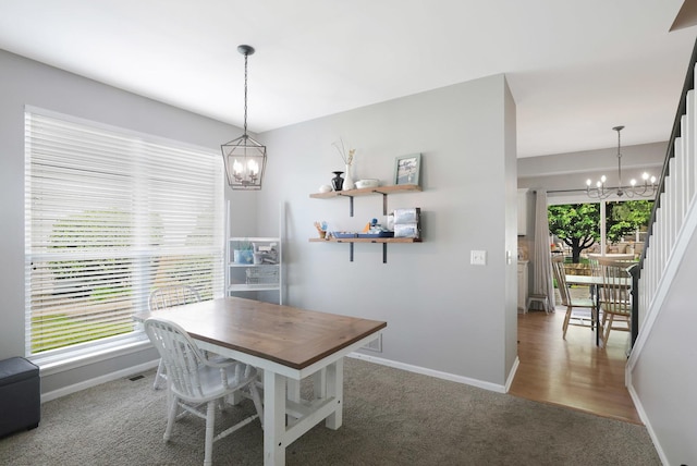 10628 Great Plaines Dr, Huntley, IL 60142 - carpeted dining room featuring a chandelier