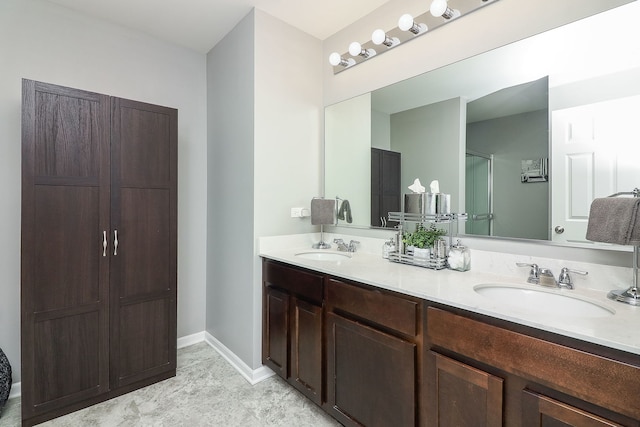 1307 Colaric Dr, Joliet, IL 60431 - bathroom with double vanity and baseboards