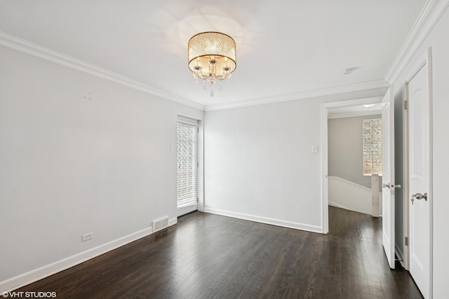 1628 Kenilworth Ave, Berwyn, IL 60402 - spare room with dark wood finished floors, a chandelier, and ornamental molding