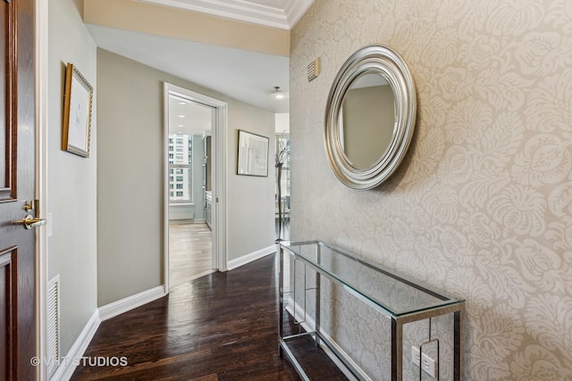25 E Superior St Unit 2402, Chicago, IL 60611 - corridor featuring wallpapered walls, wood finished floors, and ornamental molding