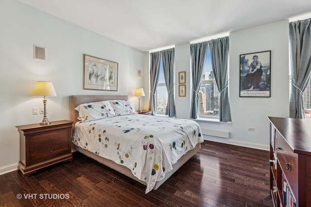 25 E Superior St Unit 2402, Chicago, IL 60611 - bedroom featuring dark wood-type flooring and baseboards