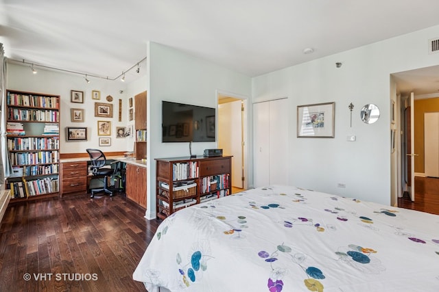 25 E Superior St Unit 2402, Chicago, IL 60611 - bedroom featuring track lighting and dark wood-type flooring