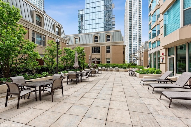 25 E Superior St Unit 2402, Chicago, IL 60611 - view of patio featuring outdoor dining space