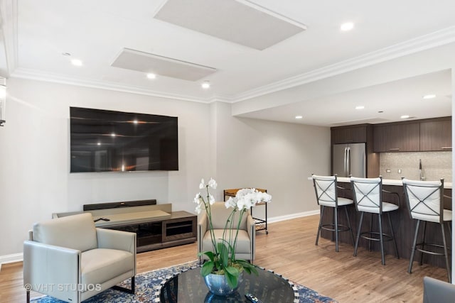 25 E Superior St Unit 2402, Chicago, IL 60611 - living area with light wood finished floors, ornamental molding, and recessed lighting