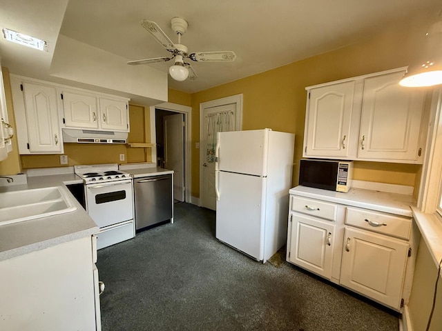 505 N Fair St, Champaign, IL 61821 - kitchen with white appliances, under cabinet range hood, white cabinets, a ceiling fan, and light countertops