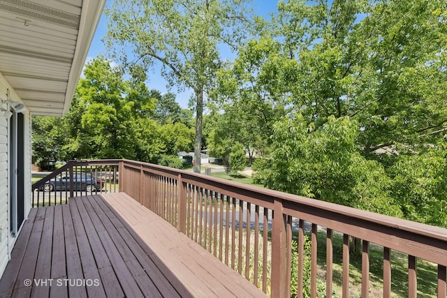 304 Pheasant Trl, Lake In The Hills, IL 60156 - wooden deck featuring view of wooded area
