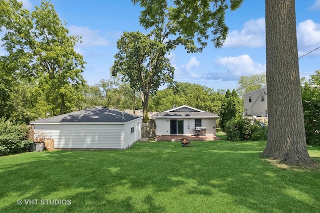 304 Pheasant Trl, Lake In The Hills, IL 60156 - rear view of house featuring a yard, a fire pit, and a patio area