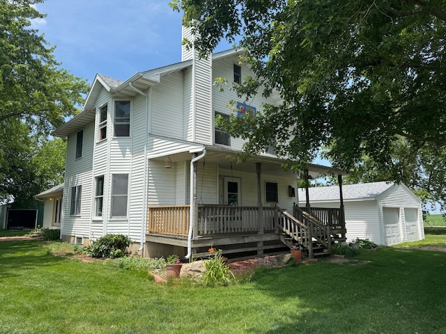 22998 E 2800 N Rd, Odell, IL 60460 - back of property with a chimney, a lawn, and a porch