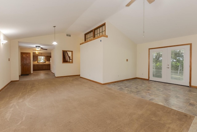 22998 E 2800 N Rd, Odell, IL 60460 - unfurnished living room featuring a ceiling fan, vaulted ceiling, french doors, and carpet floors