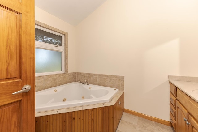 22998 E 2800 N Rd, Odell, IL 60460 - full bathroom with a jetted tub, vanity, and lofted ceiling