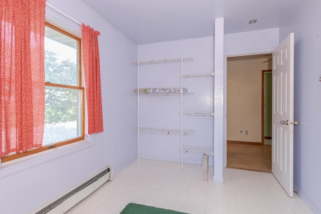 22998 E 2800 N Rd, Odell, IL 60460 - spacious closet featuring baseboard heating and light flooring
