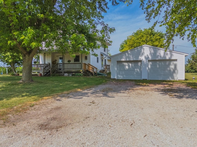 22998 E 2800 N Rd, Odell, IL 60460 - view of front of property with an outbuilding, a garage, covered porch, and a front yard