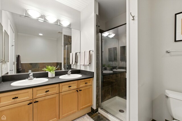 1515 N Wells St Unit 7D, Chicago, IL 60610 - bathroom featuring double vanity and a shower stall
