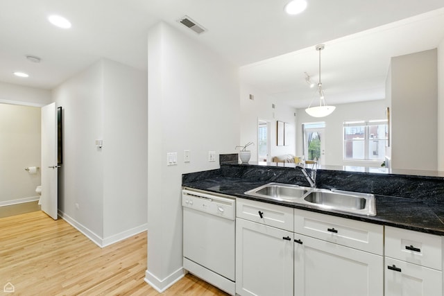 1515 N Wells St Unit 7D, Chicago, IL 60610 - kitchen with dishwasher, light wood-style flooring, white cabinetry, decorative light fixtures, and plenty of natural light
