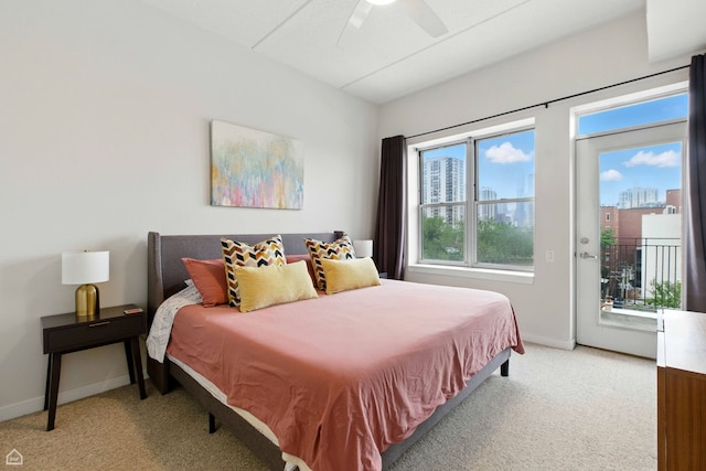 1515 N Wells St Unit 7D, Chicago, IL 60610 - bedroom with light carpet, access to exterior, multiple windows, and ceiling fan
