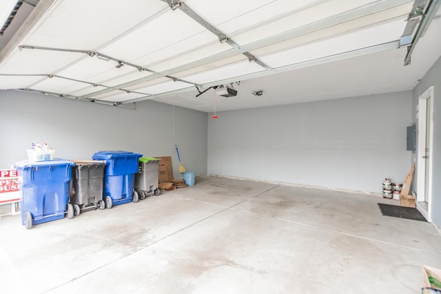 133 W Park Ave Unit A, Sugar Grove, IL 60554 - garage with a garage door opener and electric panel