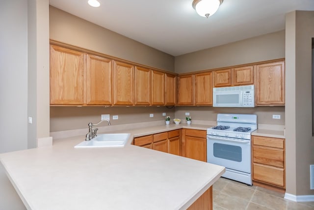 133 W Park Ave Unit A, Sugar Grove, IL 60554 - kitchen featuring white appliances, a peninsula, and light countertops