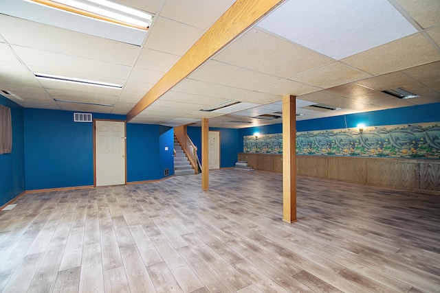 1177 N 6250w Rd, Bonfield, IL 60913 - finished basement with stairway, a drop ceiling, wood finished floors, and wooden walls