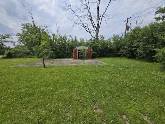 1954 E Lawrence Ave, Chicago Heights, IL 60411 - view of green lawn featuring an outbuilding