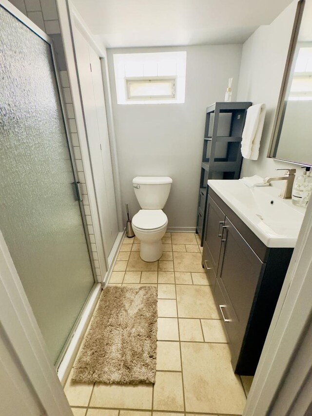 9321 S 81st Ct, Hickory Hills, IL 60457 - bathroom featuring vanity, a stall shower, and tile patterned flooring