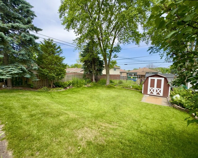 9321 S 81st Ct, Hickory Hills, IL 60457 - view of yard featuring a storage shed