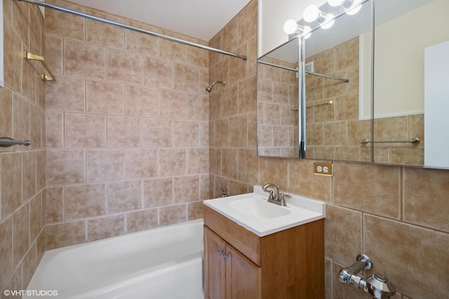 5757 N Sheridan Rd Unit 20J, Chicago, IL 60660 - bathroom with shower / bathtub combination, vanity, and tile walls