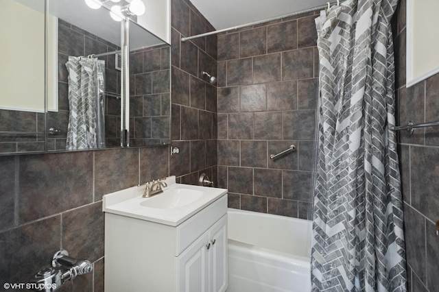 5757 N Sheridan Rd Unit 20J, Chicago, IL 60660 - full bath featuring tile walls, vanity, and shower / bathtub combination with curtain