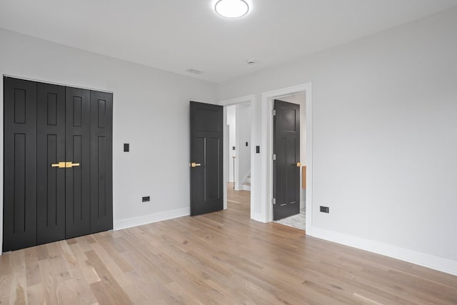 2305 W 111th Pl, Chicago, IL 60643 - unfurnished bedroom featuring light wood-type flooring and baseboards