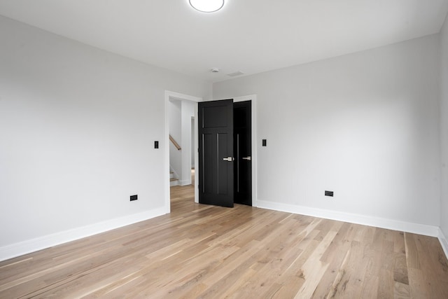 2305 W 111th Pl, Chicago, IL 60643 - empty room with light wood-style floors and stairs