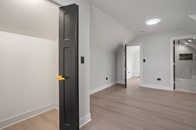 2305 W 111th Pl, Chicago, IL 60643 - additional living space featuring vaulted ceiling and wood finished floors