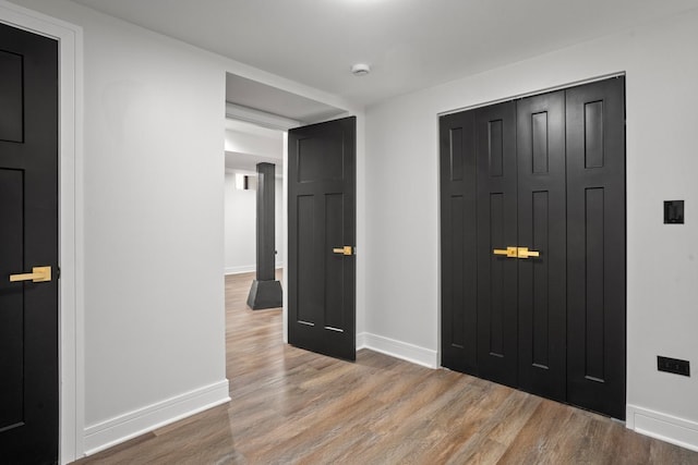 2305 W 111th Pl, Chicago, IL 60643 - unfurnished bedroom with wood finished floors and a closet