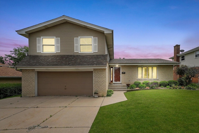 1125 Charlene Ln, Schaumburg, IL 60193 - view of front of home featuring brick siding, a garage, a yard, driveway, and a shingled roof