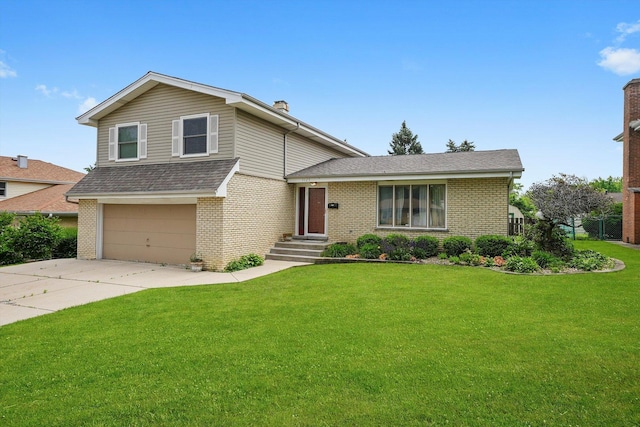 1125 Charlene Ln, Schaumburg, IL 60193 - tri-level home with an attached garage, brick siding, a front yard, and driveway